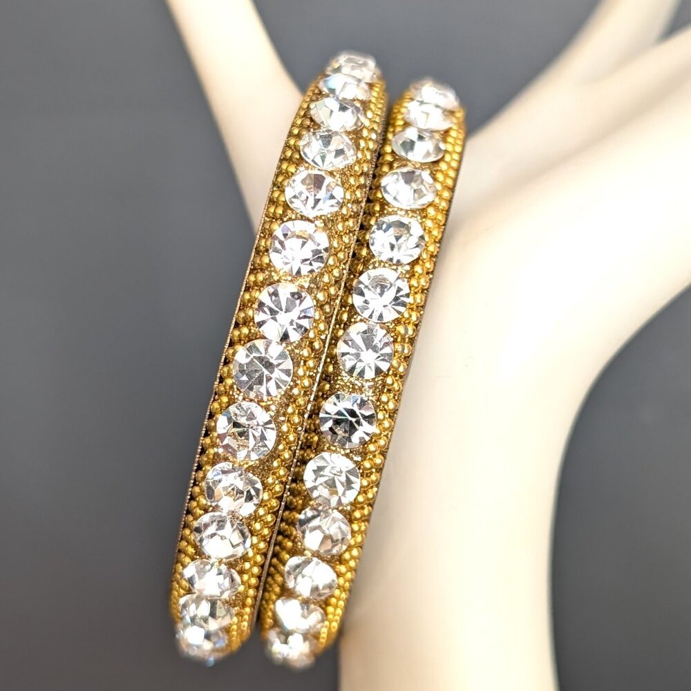 Pair of clear and gold sparkly stacking bangles
